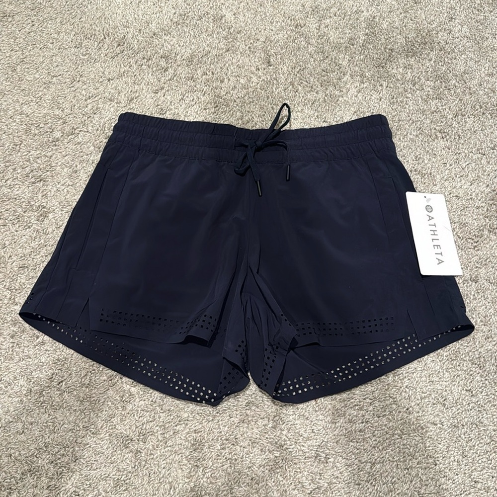 Athleta Baja shorts. Navy. Size 4. New with tags!